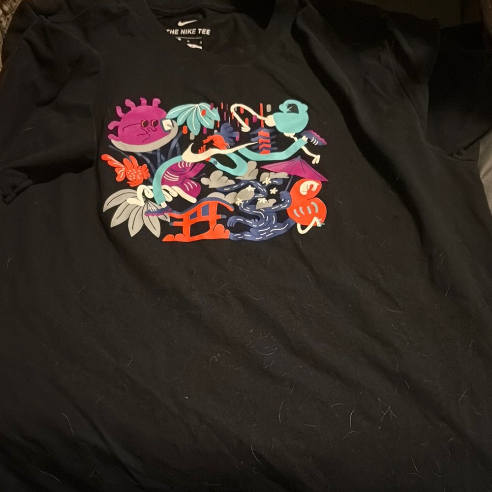 Nike Black and Purple Short Sleeve Tee with Vibrant Floral Design